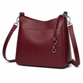 Opera women's burgundy shoulder bag zip closure detail