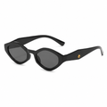 Used women's black sunglasses with grey lenses